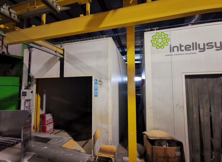 Línea de revestimiento manual con cabina de revestimiento electrostática