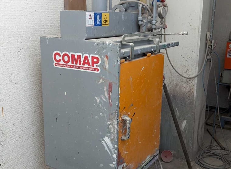Stlačenie tlačidla na zníženie zásobníka COMAP SB - 5