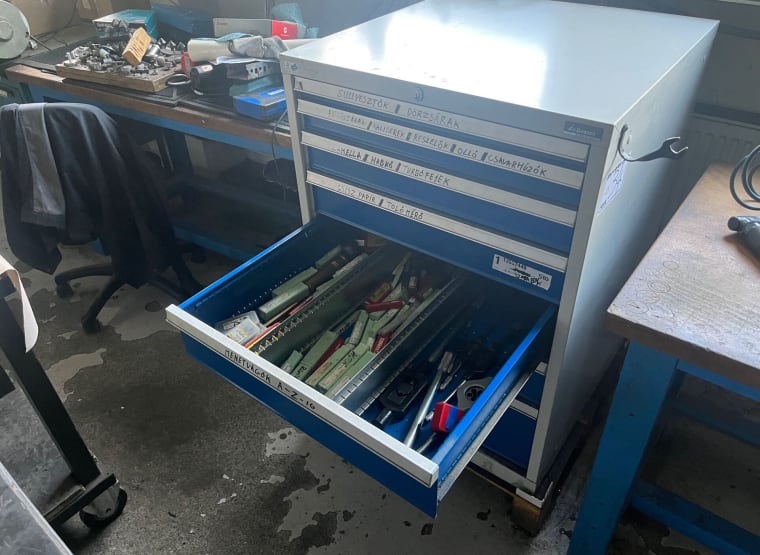 Cabinet with thread cutter tools and etc.