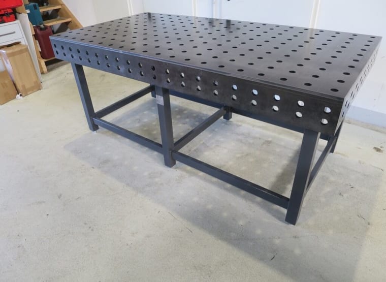 Metal table with sale holes