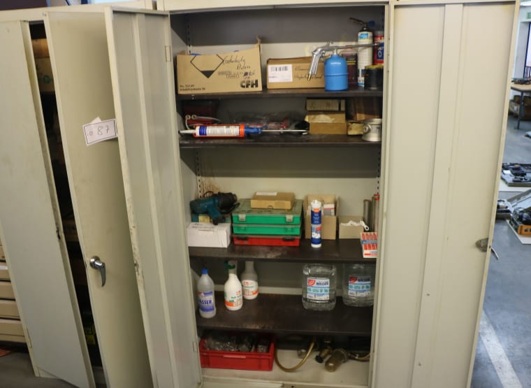 Double-door workshop cabinet with contents