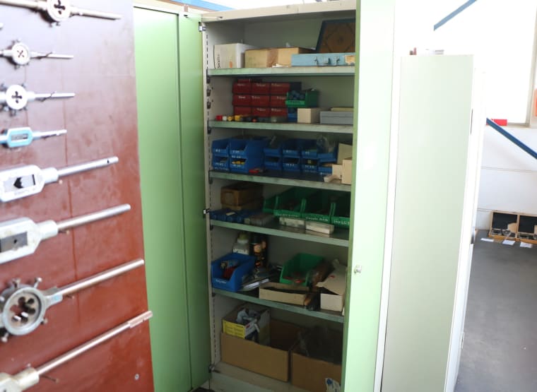 Double-door workshop cabinet with contents