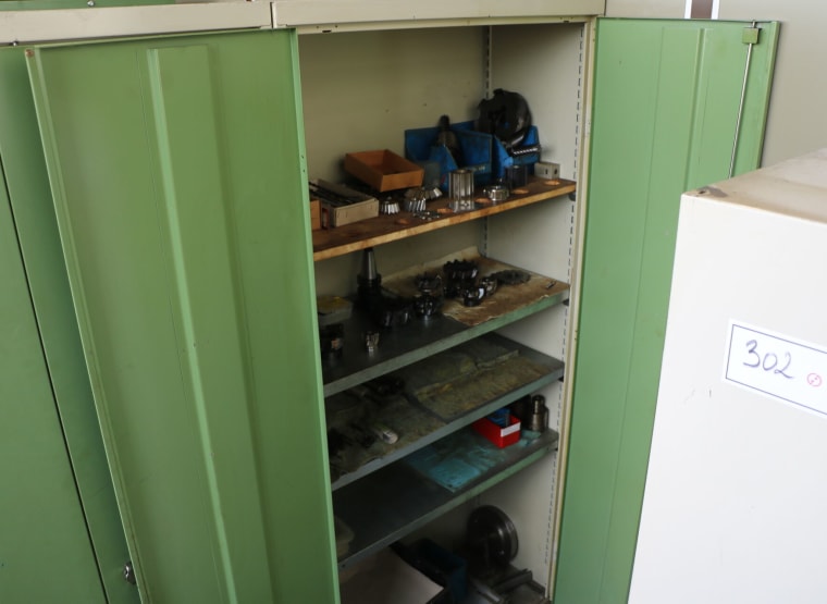 Double-door workshop cabinet with contents